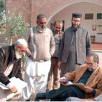 A candidate submits his nomination form to the Returning Officer for upcoming General Election 2024 for PP-79