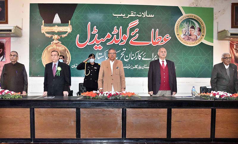 President Dr. Arif Alvi stand due to respect of National Anthem during the 29th Annual Gold Medal ceremony of Tehreek-e-Pakistan Trust organized by Nazriya-e-Pakistan Trust and Pakistan Worker Trust.