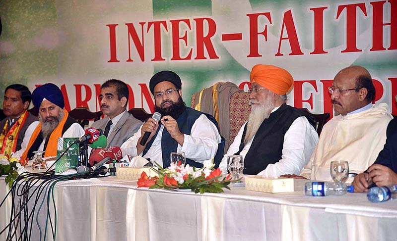 Special Assistant to the Prime Minister on Interfaith Harmony Maulana Tahir Ashrafi, Turkish Consul Journal Durmus Basttug ,and Chinese Consul General Director Mr DU YUE cutting cake during the Interfaith Harmony Conference at a local hotel.