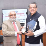 Caretaker Federal Minister for Religious Affairs and Interfaith Harmony Hon'ble Aneeq Ahmed is being presented a memento and a bouquet in a seminar on Religious Minorities and Interfaith Social Tolerance in Pakistan at NED University Karachi.