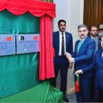 Caretaker Prime Minister Anwaar-ul-Haq Kakar unveils the plaques to inaugurate the completed Pak-China Friendship Hospital Project and the China-Aid Gwadar Seawater Desalination Project