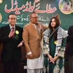 President Dr Arif Alvi distributing the Gold Medals to the Honour the workers of Pakistan Movement during the 29th Annual Gold Medal ceremony of Tehreek-e-Pakistan Trust organized by Nazriya-e-Pakistan Trust and Pakistan Worker Trust