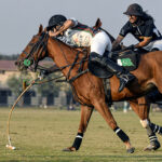 Players struggling to get hold on the ball during semi Final match between FG DIN Polo VS Master Paints Newage Cables in 4th Allama Iqbal Polo Cup 2023 at Jinnah Polo Fields