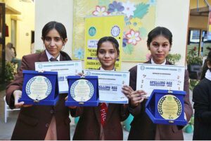 Students answering the questions during 73 School Teams Spelling Bee Compaction at Hayat Girls School and college