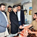 Caretaker Prime Minister Anwaar-ul-Haq Kakar enquiring about the health of those injured in the Dera Ismail Khan blast during his visit of CMH D.I.Khan.