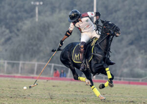 Players struggling to get hold on the ball during semi Final match between FG DIN Polo VS Master Paints Newage Cables in 4th Allama Iqbal Polo Cup 2023 at Jinnah Polo Fields