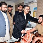 Caretaker Prime Minister Anwaar-ul-Haq Kakar enquiring about the health of those injured in the Dera Ismail Khan blast during his visit of CMH D.I.Khan.