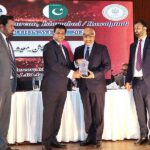 Mirza Irfan Baig, Director General NAB Rwp/Isb, presents a souvenir to Dr. Muhammad Amjad Saqib, Chairperson BISP, at an event organized by the National Accountability Bureau (NAB) and Legal Aid and Justice Authority (LAJA).