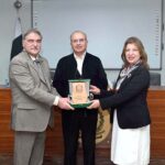 DG, FJA, Mr.Hayat Ali Shah presents a shield to DG, KP Judicial Academy, Ms Farah Jamshed during a ceremony at the Federal Judicial Academy. Mr.Justice Syed Mansoor Ali Shah, Judge, SCP also seen in the picture