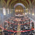 Christian community members performing religious rituals on the occasion of Christmas Day a St. Anthony's Church, in the City