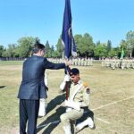 Caretaker Prime Minister Anwaar-ul-Haq Kakar presents the championship flag to Rustam house on the occasion of the 58th Parents' Day at Cadet College Kohat