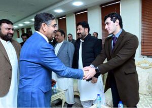 Caretaker Prime Minister Anwaar-ul-Haq Kakar meets the families of martyrs
