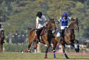Players struggling to get hold on the ball during polo match played between RIjas Polo vs. Diamond Paints Platinum Homes during Hamadan Lahore Open Polo Championship 2023