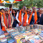 Caretaker Minister for Culture and Sports Dr Syed Junaid Ali Shah visits book stall during Sindh Sufi Festival at Sindh Museum