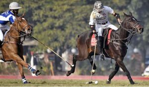 Players struggling to get hold on the ball during polo match played between RIjas Polo vs. Diamond Paints Platinum Homes during Hamadan Lahore Open Polo Championship 2023