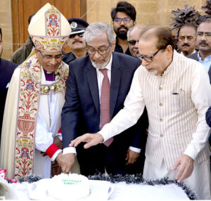 Caretaker Sindh Chief Minister Justice (Retired) Maqbool Baqir along with Caretaker Provincial Minister for Information and Minorities, President Karachi Arts Council, Muhammad Ahmed Shah talking to media during their visit to St Petrich Cathedral Church on the eve of Christmas Day celebrations