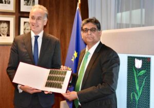The Dutch Secretary General for Foreign Affairs and Ambassador Suljuk Mustansar Tarar unveiling the stamp issued by Pakistan Post to mark 75 years of bilateral relations.