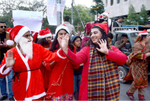 Pakistan Minority Rights activists dressed as Santas took part in a Christmas Peace Rally to celebrate the Christmas season