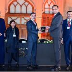 Caretaker Prime Minister Anwaar-ul-Haq Kakar distributing awards among the Top 25 Companies for their stellar performance at Pakistan Stock Exchange