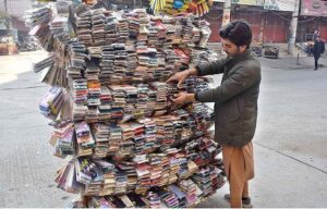A vendor selling mobile accessories at Commercial Market.