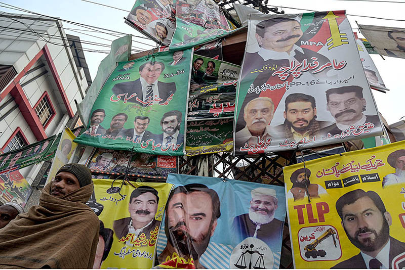 A view of posters of different candidates at Banni Chowk in connection with upcoming General Elections-2024