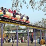 People enjoying mini train ride at Lake View Park.