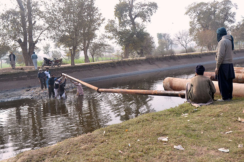Workers busy installing Sewage pipes