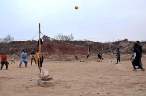 Youngsters playing a Volleyball at F-11 in the Federal Capital
