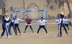 Players in action in handball match played between Multan Board and Lahore Board teams during Pakistan Inter Board Girls Handball Championship at BISE Ground.