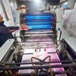 Worker busy in printing different political parties posters at his workplace in Mohallah Jhangi in connection with upcoming general elections.