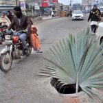 A view of open main hole at Khayam Chowk may cause any mishap and needs the attention of concerned authorities.