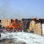 Directorate of Intelligence & Investigation officials set on fire illegal cigarette carton at Gunjo Takkar Mountain