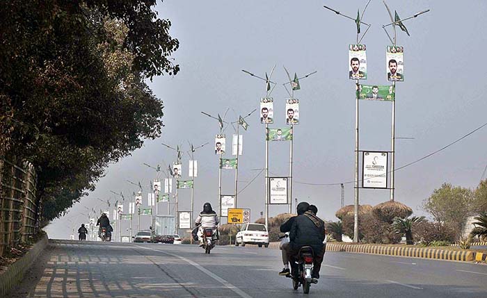 A view of banners displayed on poles at Airport Road in connection with upcoming general elections.