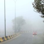 A view of thick fog that engulfs the whole city during morning time in the Federal Capital.