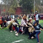 Teachers and Students participating in the Tug of War game in the annual Sports Gala during the 10 Years celebrations of The Women's University.