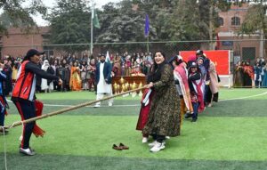 Teachers and Students participating in the Tug of War game in the annual Sports Gala during the 10 Years celebrations of The Women's University.