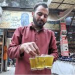 A vendor selling ‘Peshawari Qehwa’ at Abpara Market in Federal Capital