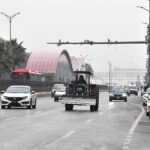 Vehicles on the way during light showers that experienced Federal Capital.
