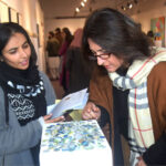 Visitors viewing the displayed art stuff during Art exhibition of Degree Show 2023 at NCA