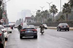 Vehicles on the way during light showers that experienced Federal Capital.