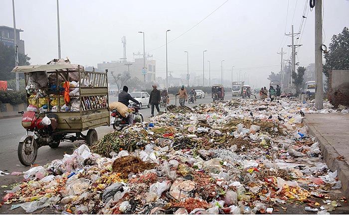 A view of garbage spreading along Sheikhupura Road creates environmental problems and needs the attention of the concerned authorities.