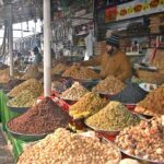 A vendor selling dry fruit at H-9 weekly bazar.