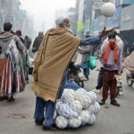 A vendor is selling footballs at Katchery bazaar.