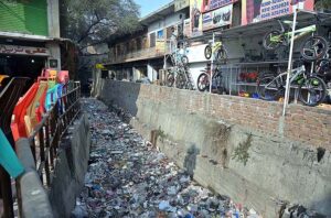 A view of nullah filled with garbage creating environmental problems needs the attention of concerned authorities.
