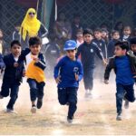 Students participating in race competition during Annual Sports Day at SZABIST School and Intermediate College