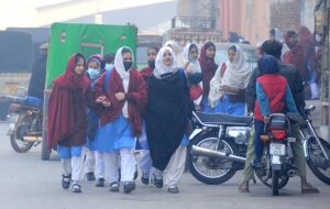 Students returning home after attending school, Govt announced to reopen the schools with changed timing after winter vacation.