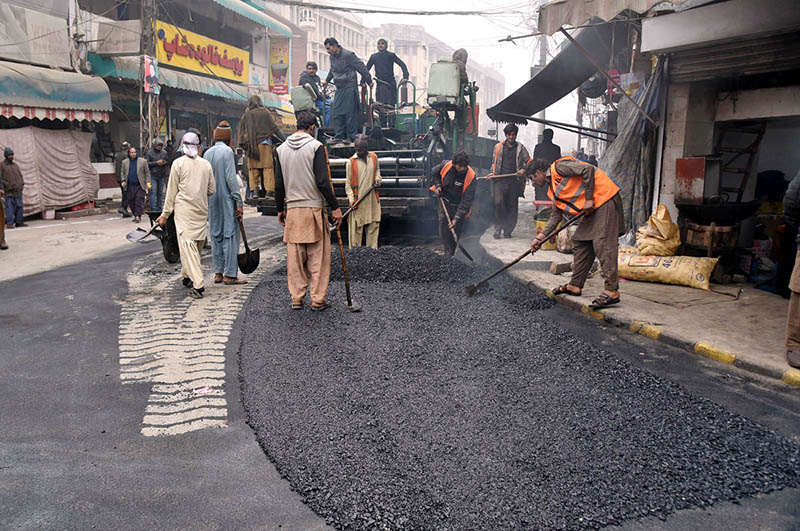 Heavy machinery is being used for carpeting on old Anarkali Main Road