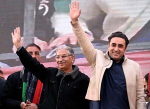 Chairman of Pakistan People's Party (PPP) Bilawal Zardari Bhutto waves his supporters during a public meeting at Liaquat Bagh