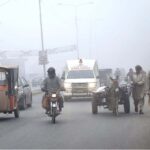 A view of dense fog covering surrounding areas of Road during morning time