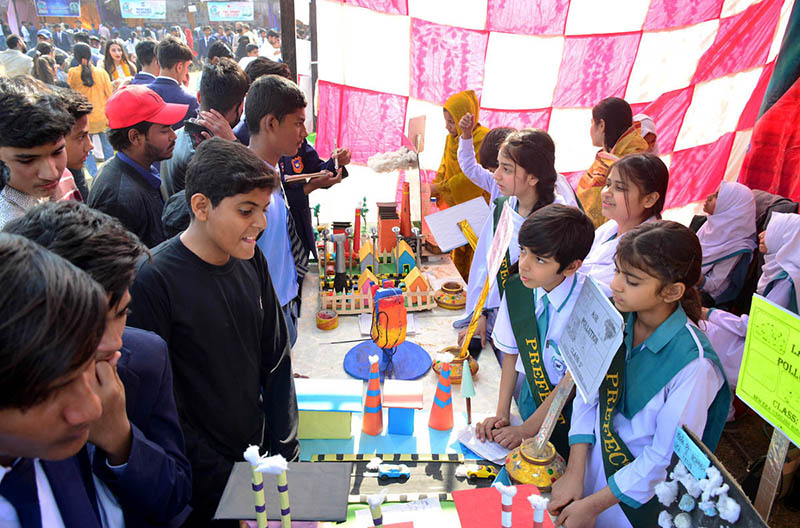 Visitors viewing the project models made by students during the Science and Art Exhibition at Public School.